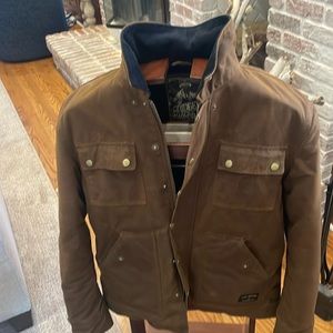 Heavy-duty Cone Mills waxed canvas winter jacket by Pack Animal & Tobacco Road.